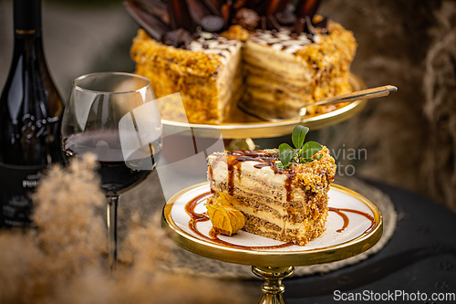 Image of Slice of layered walnut cake