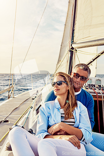 Image of Retirement, investment and luxury with couple on yacht for summer, relax and wealth on Bali trip. Travel, love and ship with baby boomers man and woman sailing on boat for tropical vacation at sea