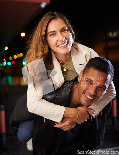 Image of Couple of friends, piggyback and night portrait on city street or road in birthday celebration, romance date and goofy game. Smile, happy and man carrying woman in comic activity and silly bonding