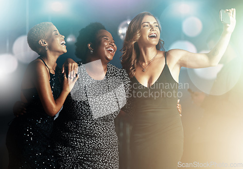 Image of Friends, laughing or phone selfie on party dance floor in nightclub event, bokeh disco or birthday celebration. Smile, happy or bonding women on mobile photography for social media or profile picture