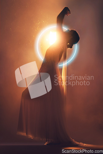 Image of Orange lighting, art deco and silhouette of woman with neon circle for creative, fantasy and beauty. Dance, aesthetic and shadow of angel or goddess for dream, magic and freedom in glowing studio