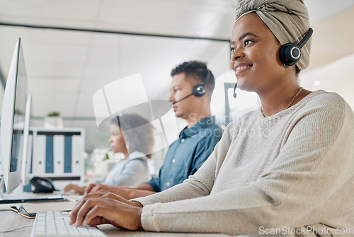 Image of Black woman, call center consultant and contact us with CRM and happy employee at desk with keyboard and computer. Communication in customer service or telemarketing with tech support and online.