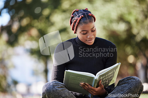 Image of Black woman, reading book or nature park, garden or environment field in college, university or school study. Student, notebook or campus graduate with learning goals, education target or scholarship