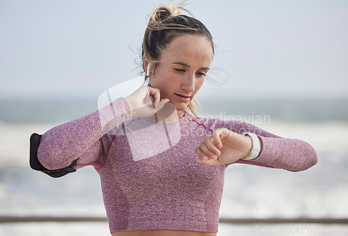 Image of Young woman, fitness and heart rate on neck pulse for nature training. Sports runner, athlete and girl check smart watch, health progress or exercise time to monitor workout progress, energy and body