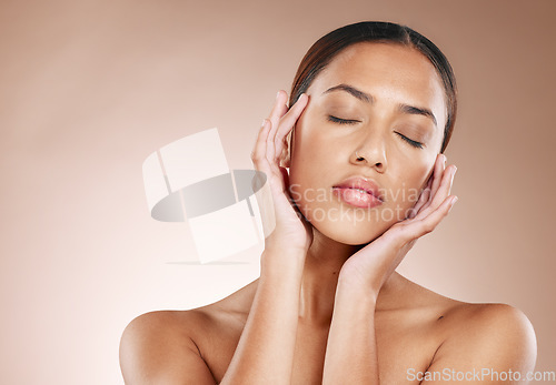 Image of Skincare, beauty and relax, woman with eyes closed and facial massage on studio background. Makeup, glamour and luxury skin care with hands massaging face, mockup for acupressure detox on black woman