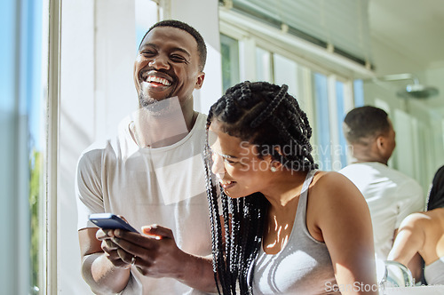 Image of Phone, laughing and black couple in home on social media reading funny meme or joke. Relax comedy, cellphone and happy man and woman with mobile smartphone streaming or watching comic video online.