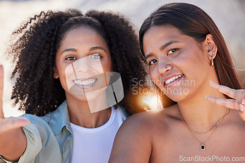 Image of Lesbian women, beach portrait and selfie for peace, love and face on summer holiday, travel and freedom. Gay, happy and friends taking photograph at sea for social media, video call or relax together