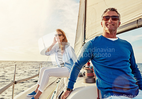 Image of Mature couple, people or sailing yacht bonding on ocean, sea or water in relax holiday, vacation or summer adventure. Smile, happy man or woman on luxury boat in retirement travel location or freedom