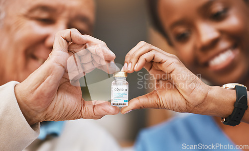 Image of Covid vaccine, heart hands and nurse with patient in support of medical development, wellness medicine and vial bottle. Corona virus vaccination, healthcare and finger shape for hope, trust and risk