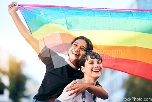 Image of Love, lesbian and couple with pride, lgbtq and happiness for relationship, smile and rainbow flag. Women, friends and queer people bonding, loving and dating for romance, sexuality or gender equality