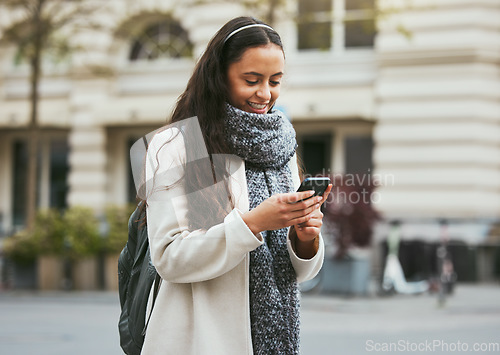 Image of Travel, walking and woman with phone in city in street, road and sidewalk in for urban adventure in London. Social media, freedom and girl using mobile app, digital map and internet on smartphone