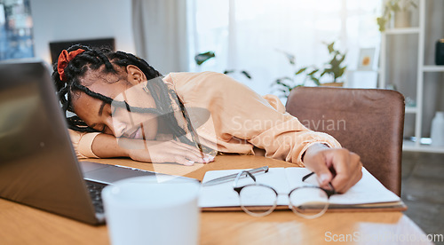 Image of Black woman, sleeping and studying in home office with a book while learning online with fatigue. Entrepreneur person tired, burnout and exhausted with remote work and startup business stress