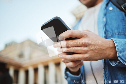 Image of Student, hands or phone typing on university campus, college or school for exam schedule, class calendar or social media. Zoom, man or mobile technology for education learning app or diploma research