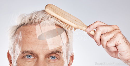 Image of Face, man brush and hair care on studio background with beauty, barbershop salon and cosmetics. Closeup portrait of male model with comb, hairstyle and scalp product, healthy shampoo and skincare