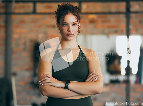 Image of Fitness portrait, exercise and serious woman at gym for a workout, training and body motivation at health club. Face of sports or athlete female focus on performance, progress and healthy lifestyle