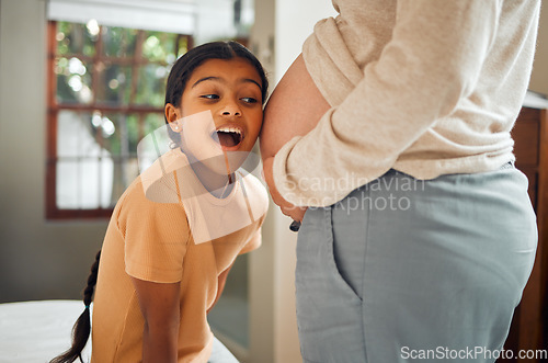 Image of Pregnant, family and excited with a girl listening to the belly of her mother while bonding in the bedroom of their home. Kids, mom and pregnancy with a daughter hearing the stomach of her mama