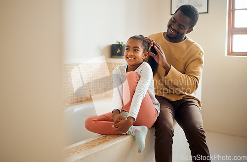 Image of Excited child, father and brushing hair in family home bathroom with love and support. Black man teaching kid self care, health tips and wellness with communication, talking about trust and beauty