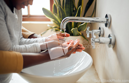 Image of Cleaning hands zoom, people and hygiene in bathroom, disinfection and washing, self care with water for wash. Parent, child quality time together and clean hand, happy family with health and wellness