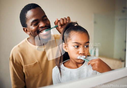 Image of Oral hygiene, brushing teeth and father with daughter in a bathroom for learning and morning grooming. Dental care, black family and girl with parent, cleaning and looking in a mirror at home