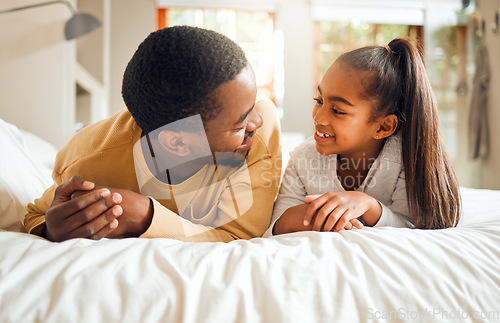 Image of Family, father and girl child talking, spending quality time together with love and care, relax in bedroom at home. Black man, kid and happy people, communication and relationship with childhood