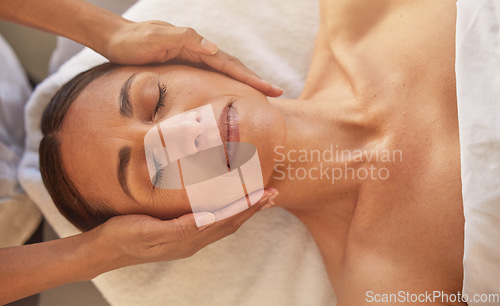 Image of Woman, face and hands for massage in beauty salon for relax physical therapy, skincare wellness and luxury spa wellness. Masseuse, facial care and dermatology therapy for body care glow from above