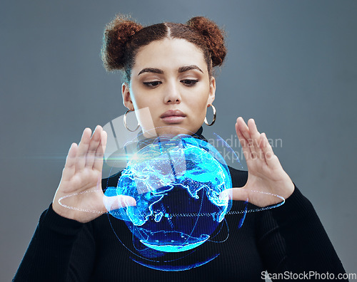 Image of Globe hologram, futuristic tech and woman, technology innovation with future, ai and cyberspace against studio background. World, network and digital with metaverse and young girl face, 3d and matrix