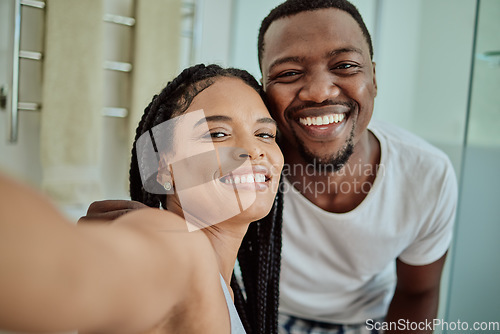 Image of Selfie, smile and portrait of an African couple with love, home memory and happy in marriage. Smile, happiness and black man and woman with a content photo together in the living room with peace