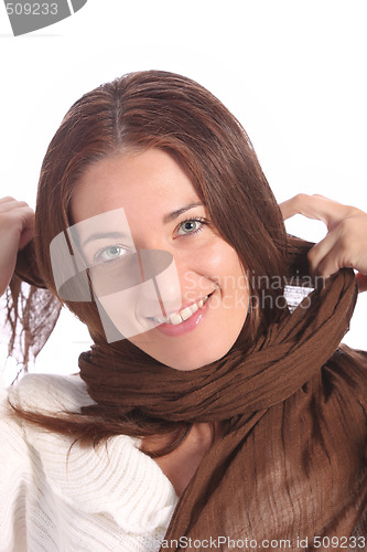 Image of beautiful young a woman with brown scarf 