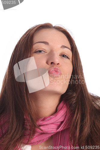 Image of beautiful young a woman sending kiss 