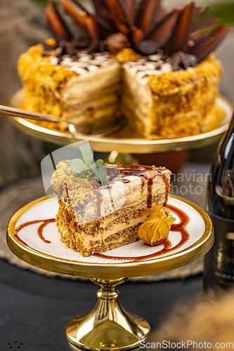 Image of Slice of cake with crushed nuts