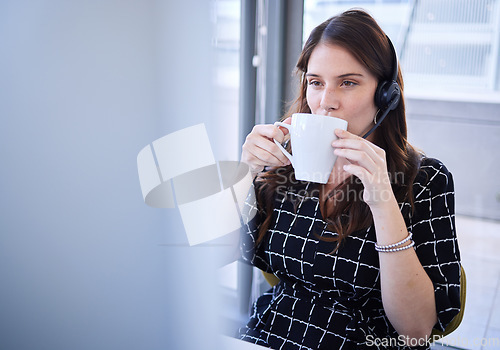 Image of Call center, coffee and person thinking of sales, telemarketing or crm strategy on her computer. Telecom, online financial advisor or virtual support agent, consultant or woman drinking tea for ideas