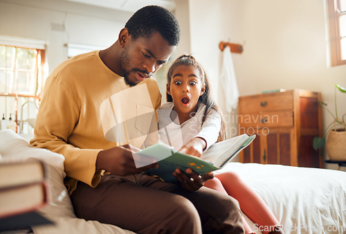 Image of Father, child and book in shock on bed for story time, reading or learning literature sitting at home. Dad and daughter surprised or shocked in frightened expression holding textbook in bedroom