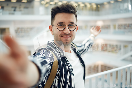 Image of Library, student selfie and man in university, college or school. Education scholarship, learning and face portrait of young male taking a photo or picture for memory, social media or online profile.