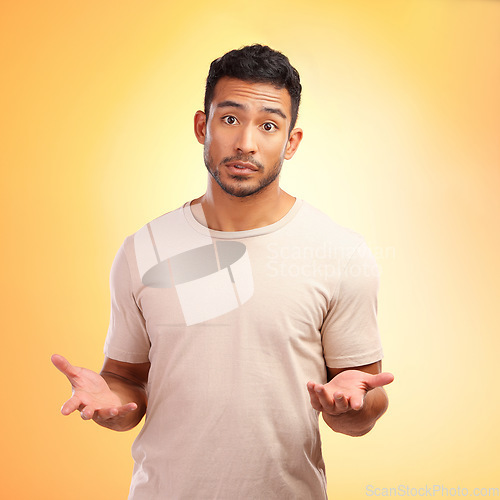 Image of Man, confused and hands out isolated with questions and asking why on yellow background with mockup. Confusion, doubt and person from India with problem and frustrated hand gesture in studio portrait