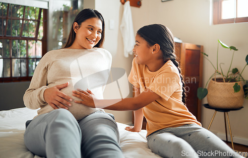 Image of Happy, pregnant and mother with kid on bed for belly touch with excited, curious and joyful smile. Indian family and child waiting for baby sibling and bonding together with mom in home bedroom.