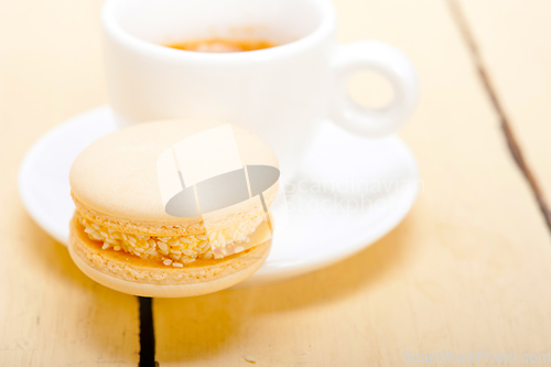 Image of colorful macaroons with espresso coffee