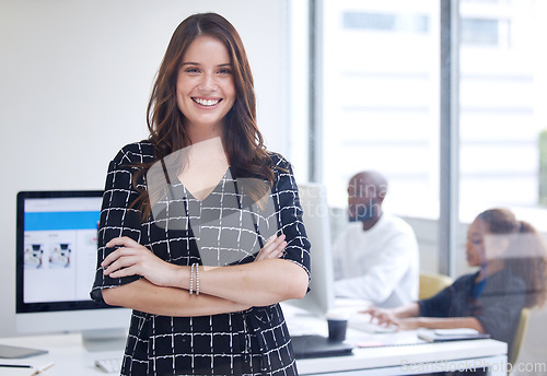 Image of Pride, expert and portrait of a woman with arms crossed for vision, success and happy at work. Motivation, professional and expert manager with confidence, smile and empowerment in an office