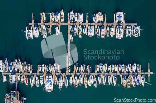Image of Ocean, harbor and drone of boats on the water for travel, sailing and holiday in Spain. Environment, marine and above of sea transportation at a port for vacation, cruise and traveling adventure