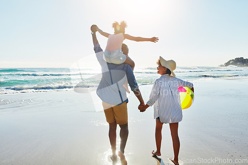 Image of Walking black family, beach and back of people holding hands, parents and child enjoy fun outdoor quality time together. Ocean sea water, freedom peace and youth kid, father and mother in Jamaica