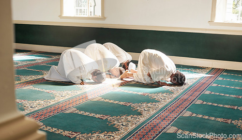 Image of Muslim, prayer and mosque with a holy man group praying together for fajr, dhuhr or asr, otherwise maghrib or ishaa. Salah, worship and pray with islamic friends at ramadan for religion in sun rays