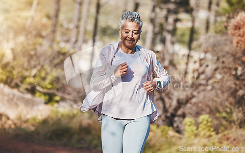 Image of Fitness, runner or old woman running in nature training, exercise or cardio workout in New Zealand park. Happy, elderly or healthy senior person smiles with pride, body goals or motivation in summer