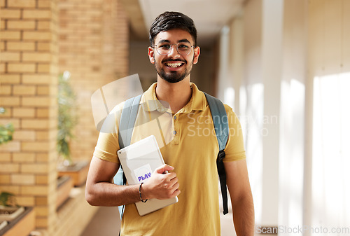 Image of Face portrait, student and man in university ready for back to school learning, goals or targets. Scholarship, education and happy, confident and proud male from India holding tablet for studying.