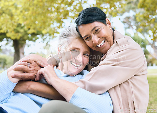 Image of Couple of friends, senior or portrait hug in nature park, garden or relax environment in retirement support or trust. Smile, happy or laughing elderly women in bonding embrace in community backyard