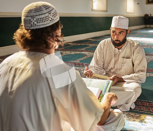 Image of Quran, muslim and mosque with an imam teaching a student about religion, tradition or culture during eid. Islam, book or worship with a religious teacher and islamic male praying together for ramadan