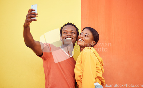 Image of Gen z, young black couple happy in selfie with smartphone and influencer with post for social media against color wall background. Smile in picture, fashion mockup and tech with man and woman youth