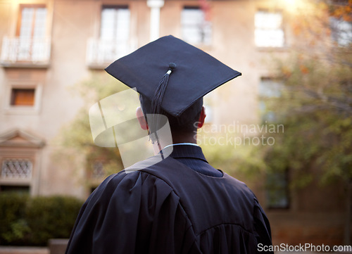 Image of Thinking graduate, man or vision on university campus, college event or school graduation ceremony and future goals. Graduation cap, robe or student with education, learning or employment opportunity