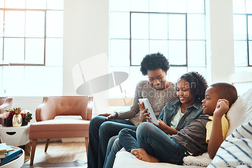 Image of Family with tablet, watch and relax at family home together, spending quality time together with technology. Black people, mother and children on sofa with device, internet wifi and social media