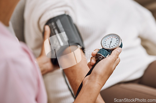 Image of Blood pressure, hypertension and nurse with patient to check diabetes, healthcare consulting and service in clinic. Closeup hands of woman doctor measure arm pulse, medical test and heart wellness