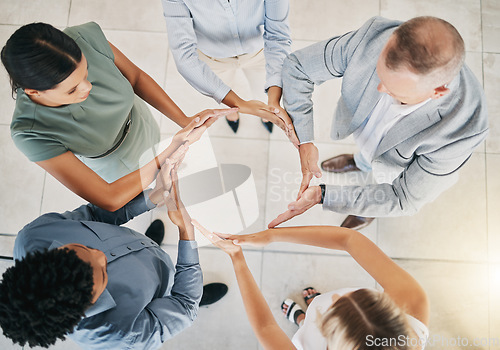 Image of Top view, business people or circle hands in collaboration, diversity team building or financial growth support. Men, women or workers solidarity gesture, teamwork mission or finance goals motivation