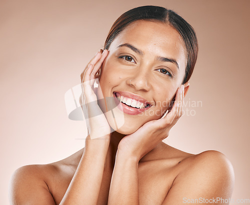Image of Skincare, beauty and, portrait of woman with hands on face and smile on studio background in Atlanta. Makeup, glamour and luxury skin care with facial massage, natural spa treatment on happy woman.